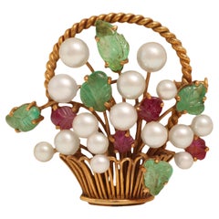 Spilla Flower Bucket Tutti Frutti 18 Kt intagliata a mano con rubini e smeraldi multi gemme