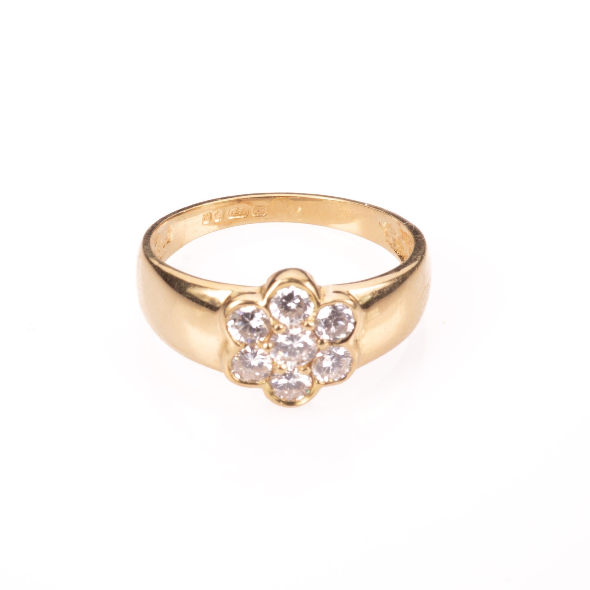 18 Kt Gold 1ct Diamond Cluster Ring
3.50 GRAMS.
Good condition, working.
Free international shipping.
