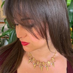 Cupid 'Eros' and Musician Angels 18 Karat Gold and Diamonds Necklace