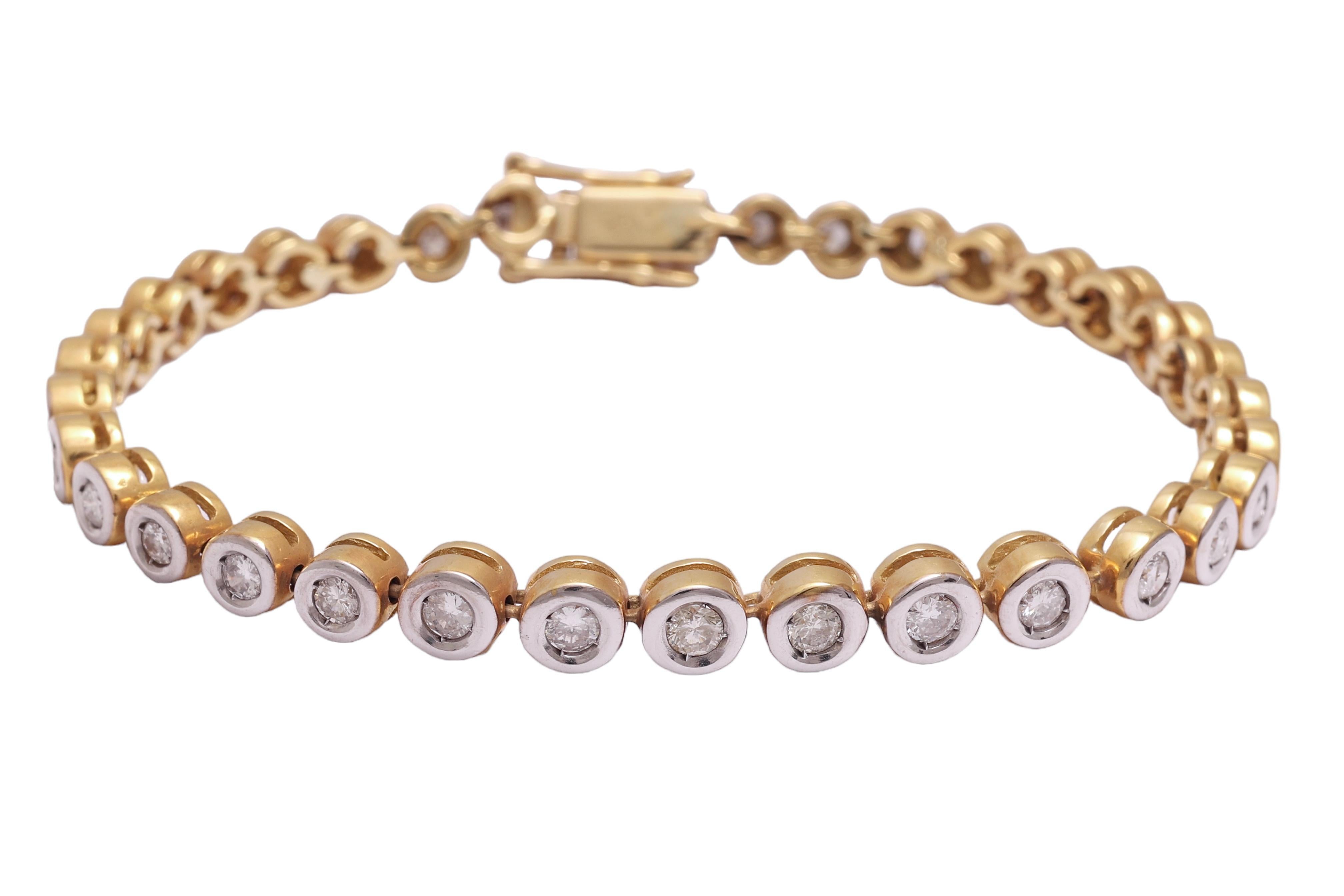 Luxurious 18 kt. Gold Bicolour Tennis Bracelet with 3.75 ct. Diamonds

Diamonds: 35 brilliant cut diamonds, together 3.75 ct.

Material: 18 kt. yellow and white gold

Measurements: Will max fit a 19 cm wrist

Total weight: 23.1 grams / 14.9 dwt /