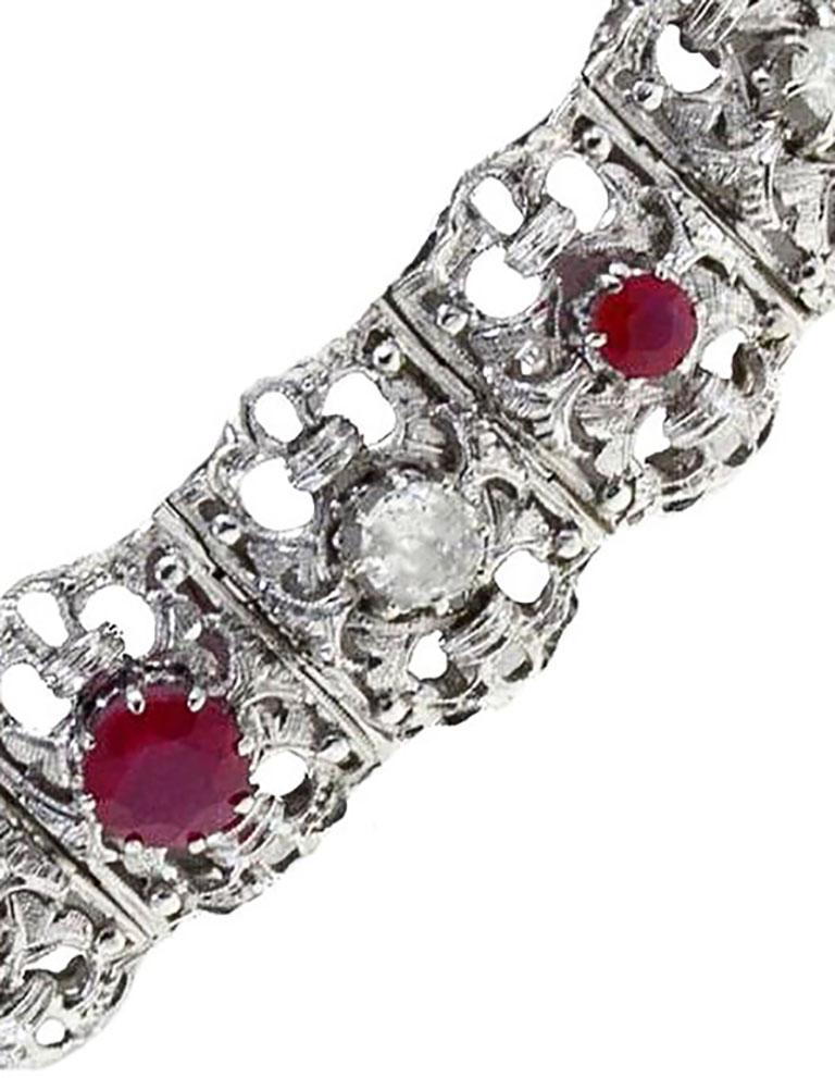 SHIPPING POLICY: 
No additional costs will be added to this order. 
Shipping costs will be totally covered by the seller (customs duties included).

Beautiful  bracelet in 18kt white gold studded with diamonds and a row of rubies and diamonds in the