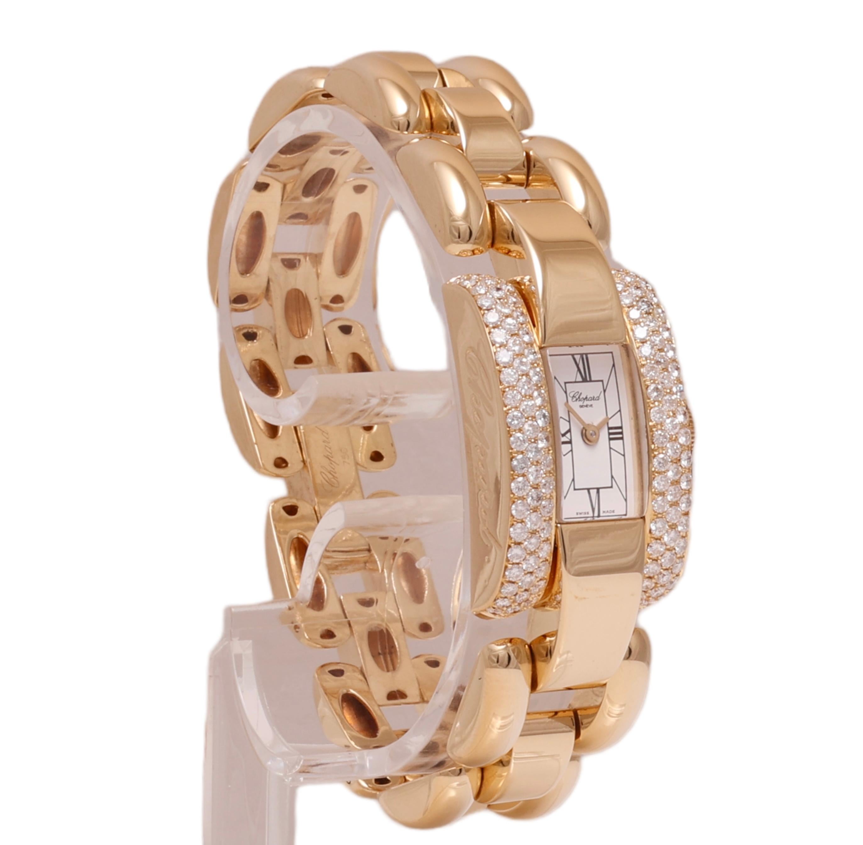 18 Kt. Gold & Diamonds Chopard La Strada Wrist Watch

Model: La Strada 

Ref number: 433 1

Movement: Quartz

Case: 18 kt. yellow gold case, measurements: 18 mm x 30 mm x 8.5 mm. With diamond bezel

Dial: White dial with Roman numerals 

Strap: 18