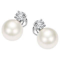 Boucles d'oreilles en or 18 carats, perles des mers du Sud de 15 mm et 2 diamants taille brillant de 0,9 carat