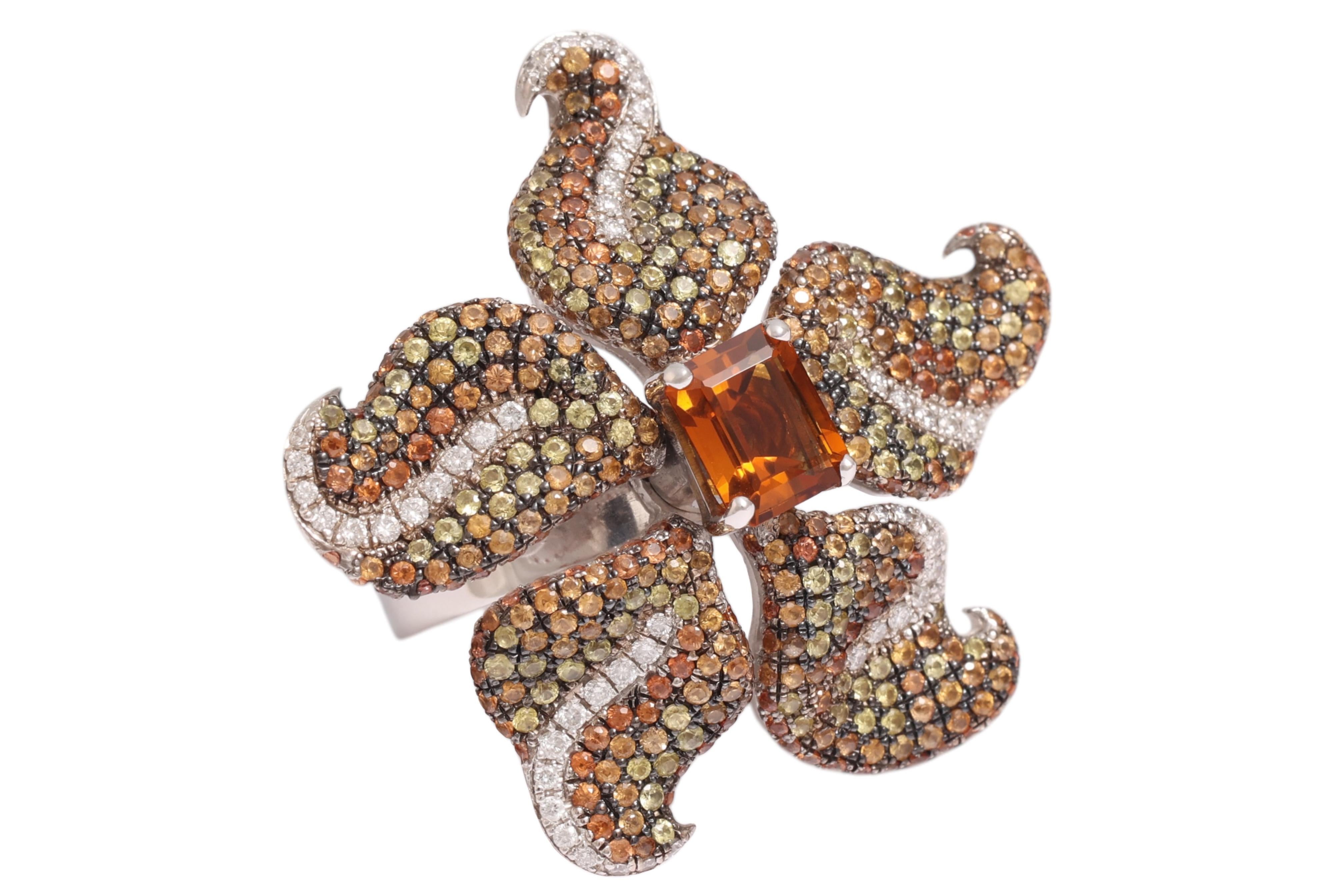 ORIGINAL & BEAUTIFUL 18 Kt SOLID GOLDEN RING WITH TSAVORITES, CITRINE & DIAMONDS

Completely hand crafted in our Atelier, one of a kind.

MATERIAL: 18 kt Solid white gold

Size: 55 1/2 EU  /     7  1/2 US ( can be resized for free)

Center Stone :