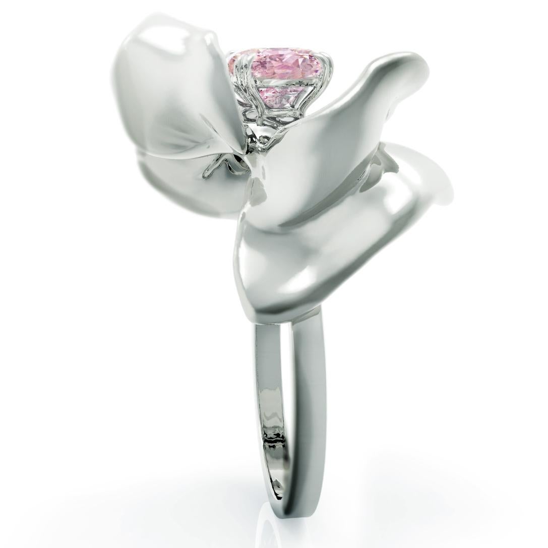 The weight of this contemporary Magnolia Flower enamel ring is approximately 8.5 grams. It is made of 18-karat white gold and features a GRS certified no-heat Padparadscha pastel pinkish-orange sapphire weighing 3.21 carats. The cushion-cut sapphire