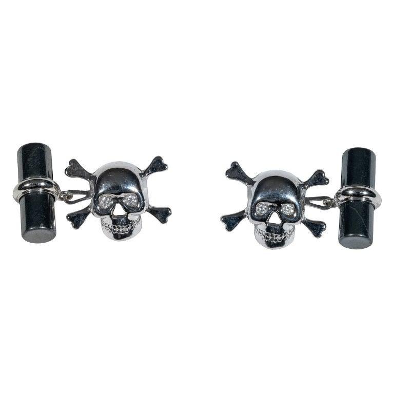 

Pair of white Gold, and hematite cufflinks depicting the skull with Diamond eyes