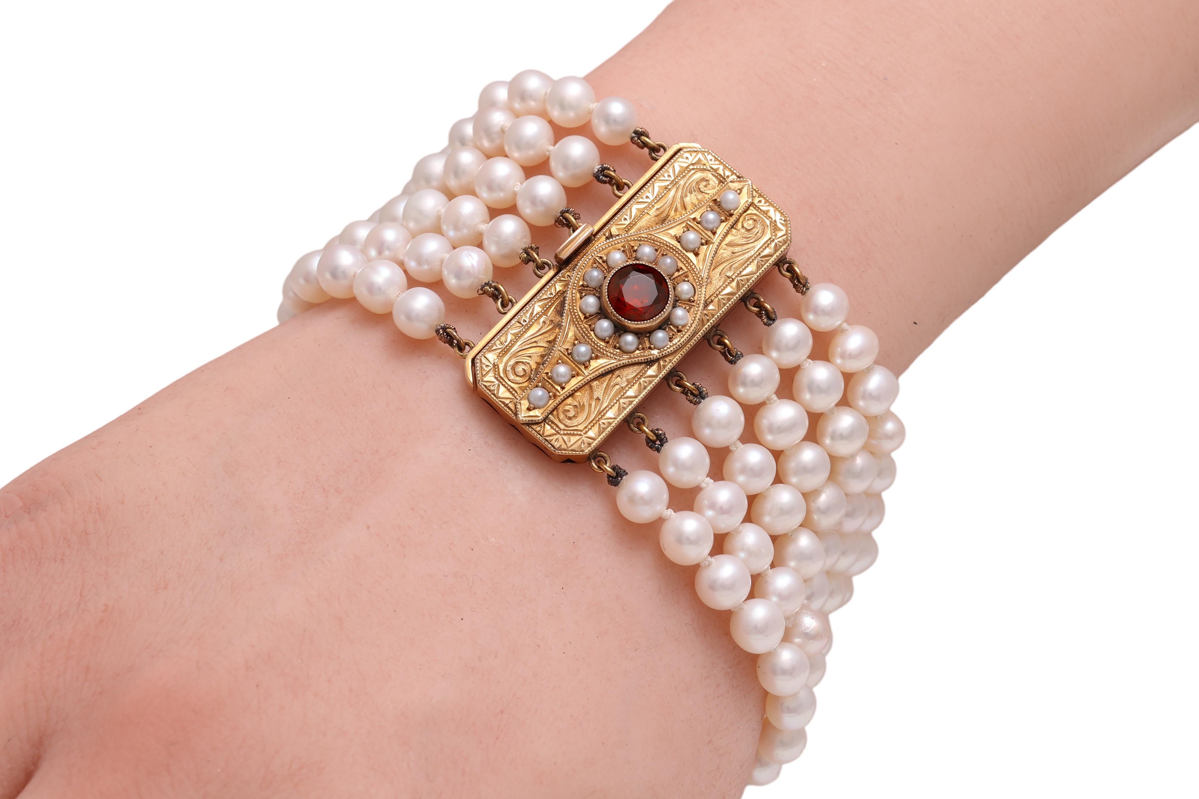 18 Kt Gold Lock, Bracelet with 6 Rows of Akoya Pearls & Art deco  1ct. Garnet  For Sale 1