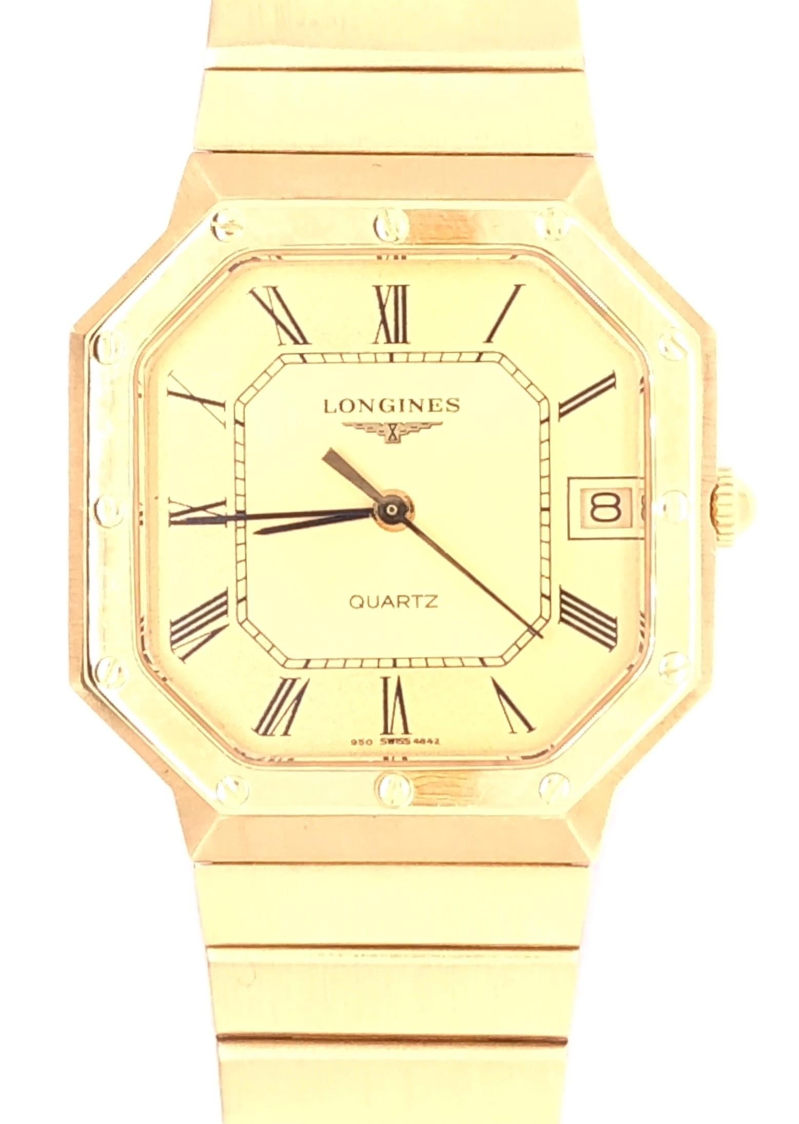 18 Kt Gold Longines Octagon Quartz Mens Dress Watch. Stylish solid 18 Kt gold Watch and Bracelet by Longines. A very nice heavy and elegant watch with an unusual octagonal case and gold bezel from one of the most stylish of watchmakers. High Quality