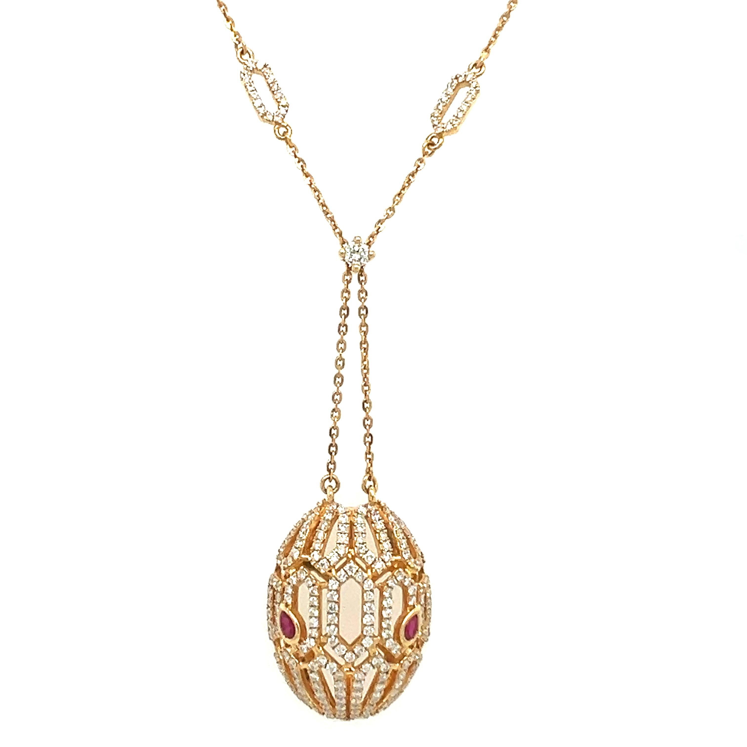 An 18-karat yellow gold necklace set with a natural 0.18-carat Ruby and 1.25-carat diamonds. This lovely, sophisticated necklace with an adjustable catch. The necklace is 18 inches long, but you may modify the size to make it 17, or 18 inches long. 