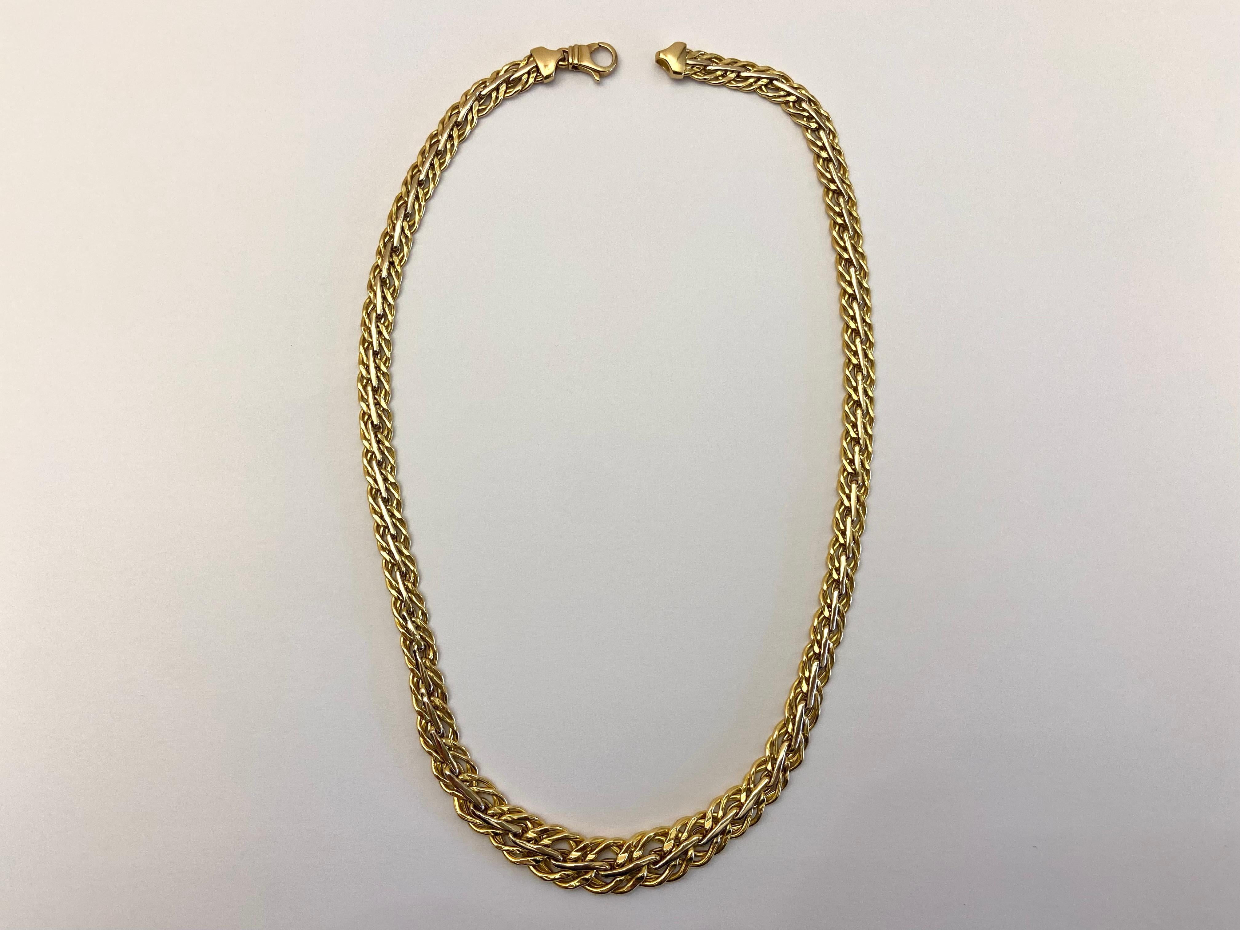 18 kt gold necklace, 45 cm long. 11 mm wide in the central part; It weighs 20.5 grams; Lobster clasp closure; Stamped with state trademarks, shipped in an elegant gift box.
