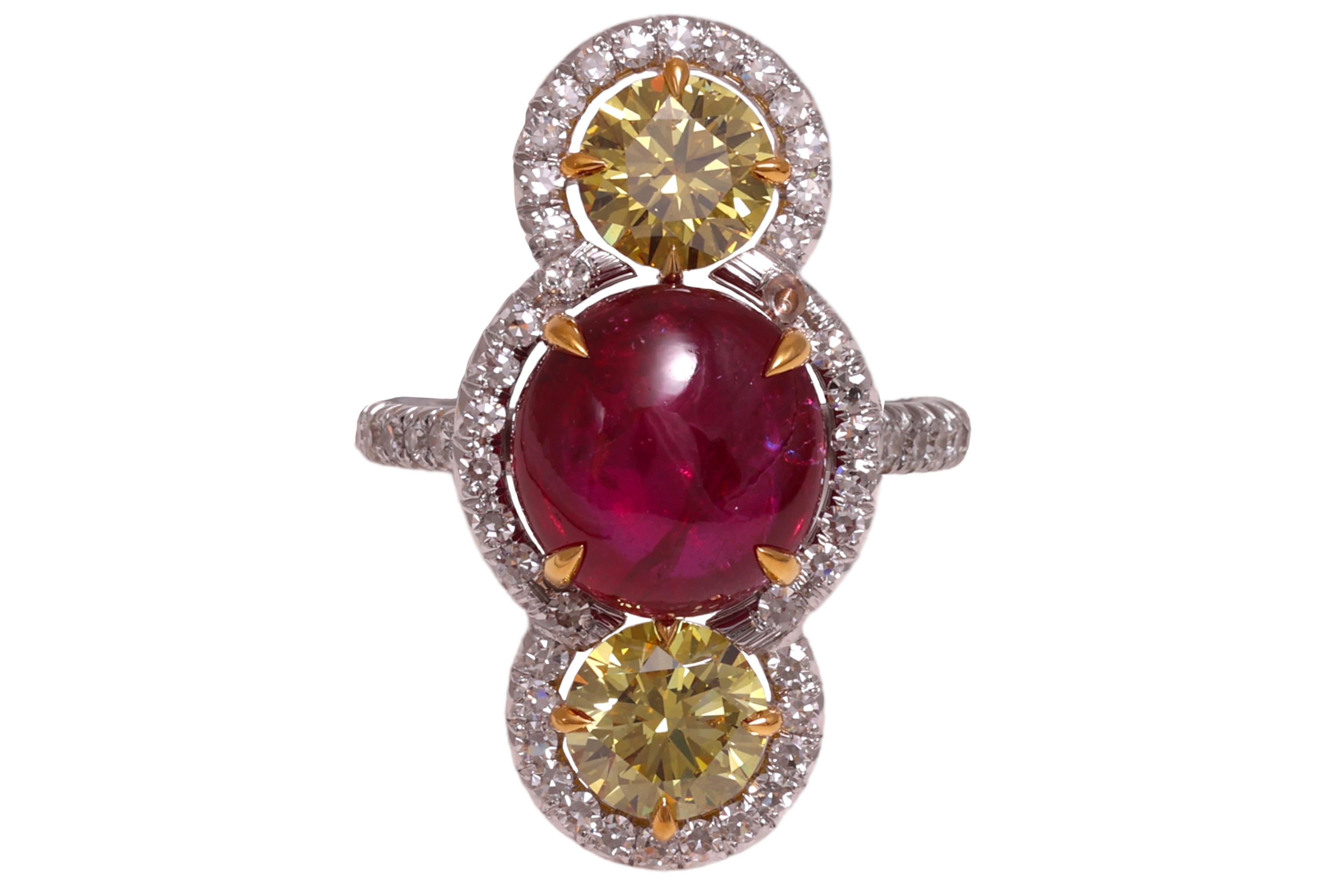 Magnificant 18 Kt. Gold No Heat Burmese Ruby Cabochon & Intense Fancy Diamonds Ring

Ruby: Red, Cabochon cut, natural corundum, No heat Burmese Ruby 6.15 ct , Looks like Pigeon Blood !
With Gubelin Certificate Report number: 15091092

Diamonds: 2