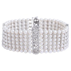 Bracelet en or 18 carats, perles et diamants, pièce d'art extrêmement raffinée