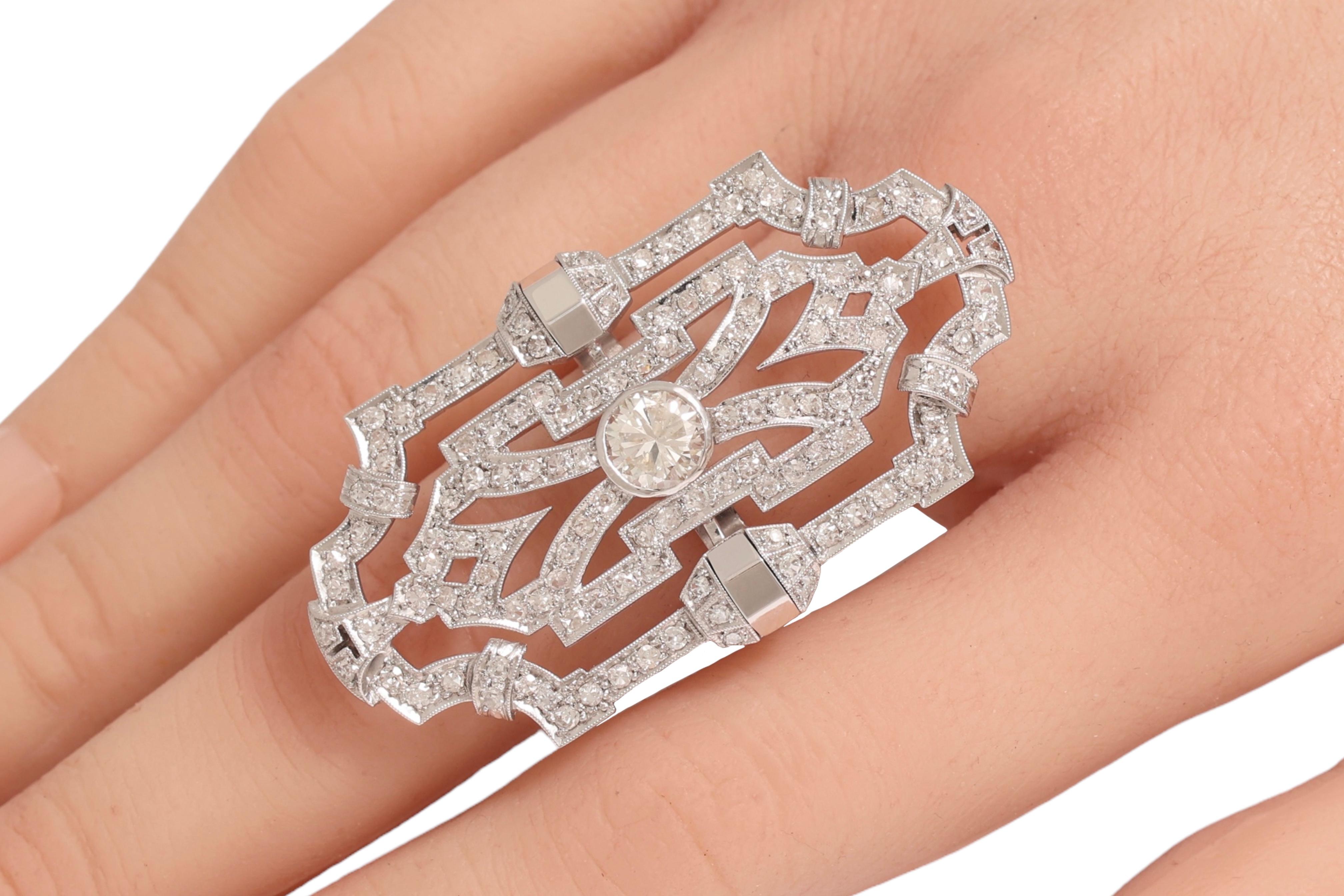 18 kt. Bague en or avec 1,2 ct. Diamant central entouré de 4,65 ct. Diamants en vente 4