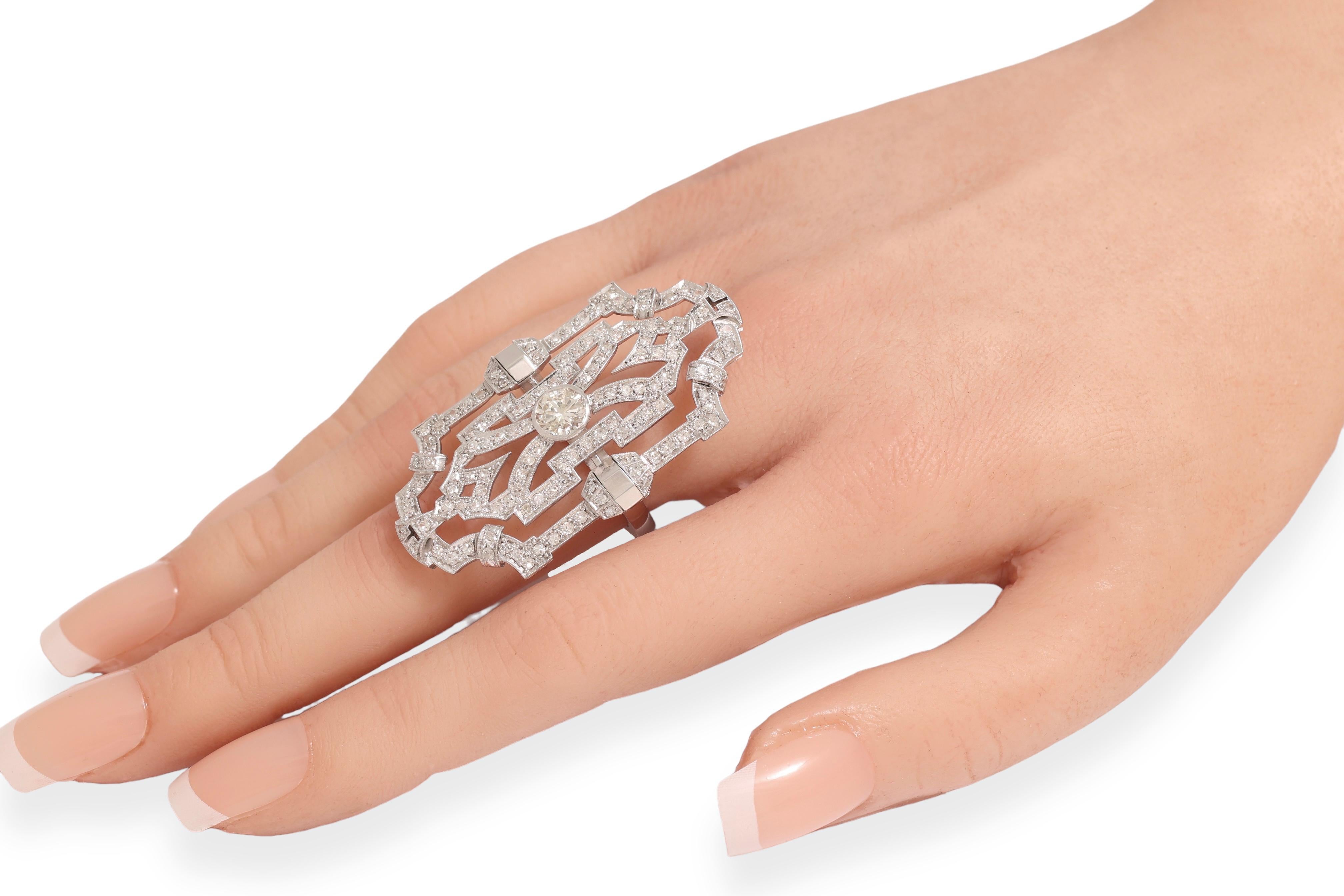 18 kt. Bague en or avec 1,2 ct. Diamant central entouré de 4,65 ct. Diamants en vente 2