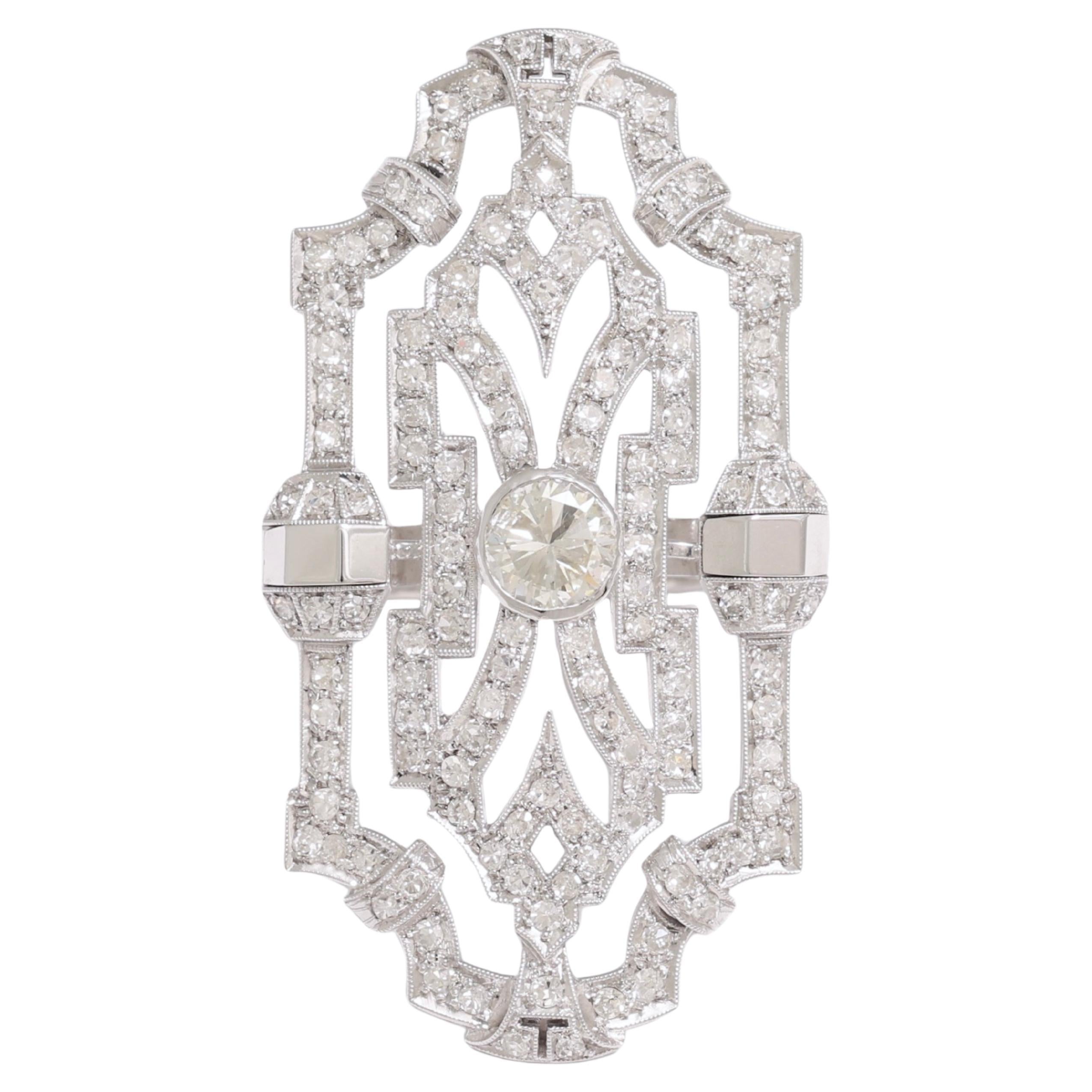 18 kt. Ring aus Gold mit 1,2 ct. Diamant in der Mitte, umgeben von 4,65 ct. Diamanten