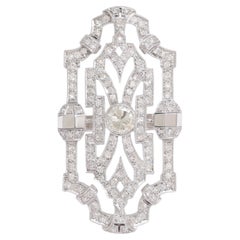 18 kt. Gold Ring Set With 1.2 ct. Centre Diamond Surrounded by 4.65 ct. Diamonds