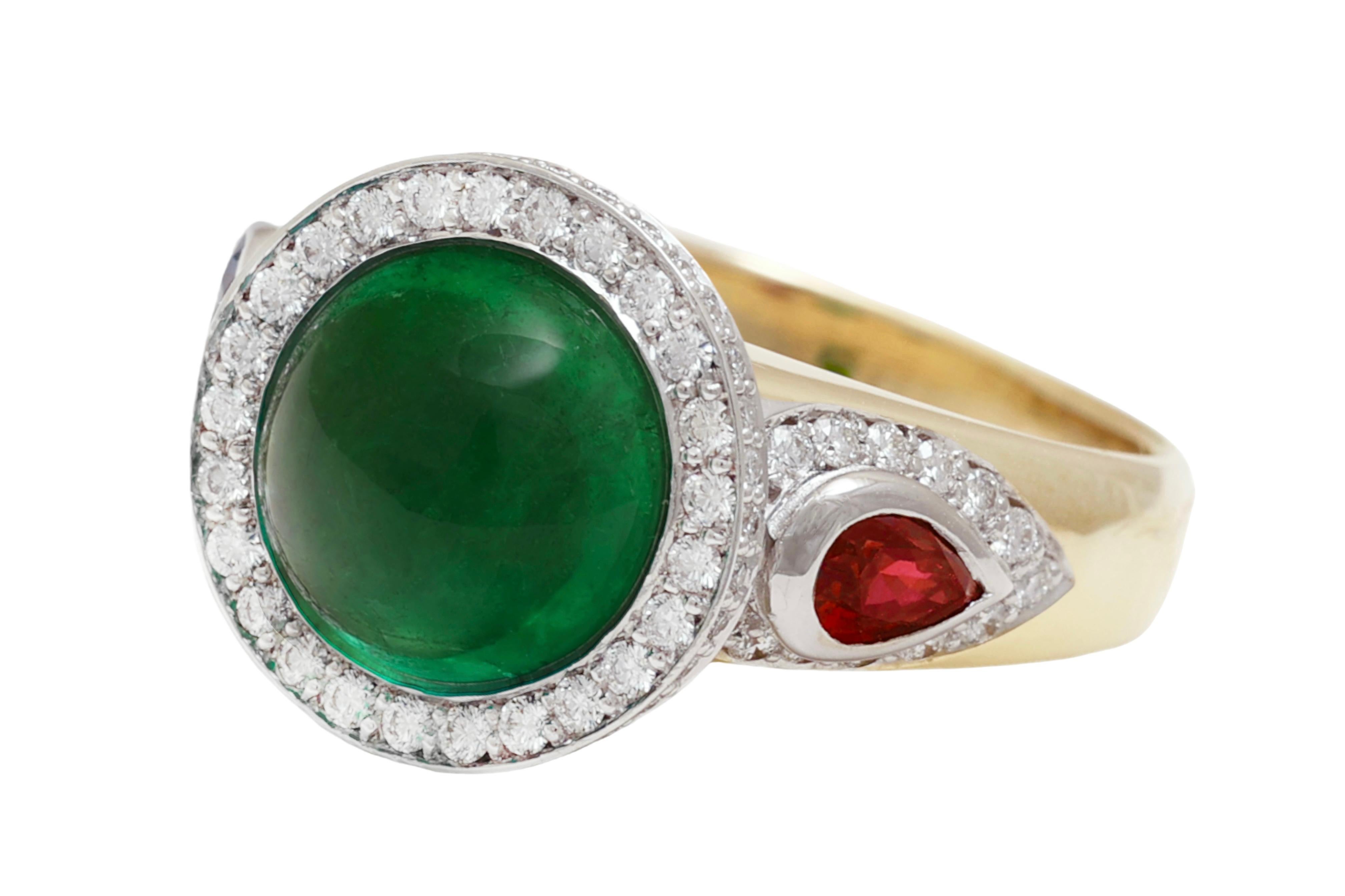 Very special, Beautiful 18 kt. Yellow Gold Ring With 3.78 ct. Minor Emerald Cabochon, Diamonds, Sapphire, Ruby 

Emerald: Intense Green Minor Cabochon 3.78 ct. with Carat Gem Lab certificate CGL 15818 

Sapphire: 1 pear shape sapphire 0.20