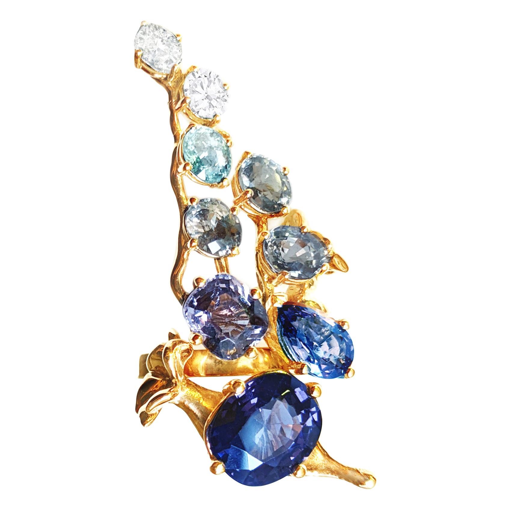 Gelbgoldring mit GRS-zertifiziertem königsblauem Saphir und Diamanten