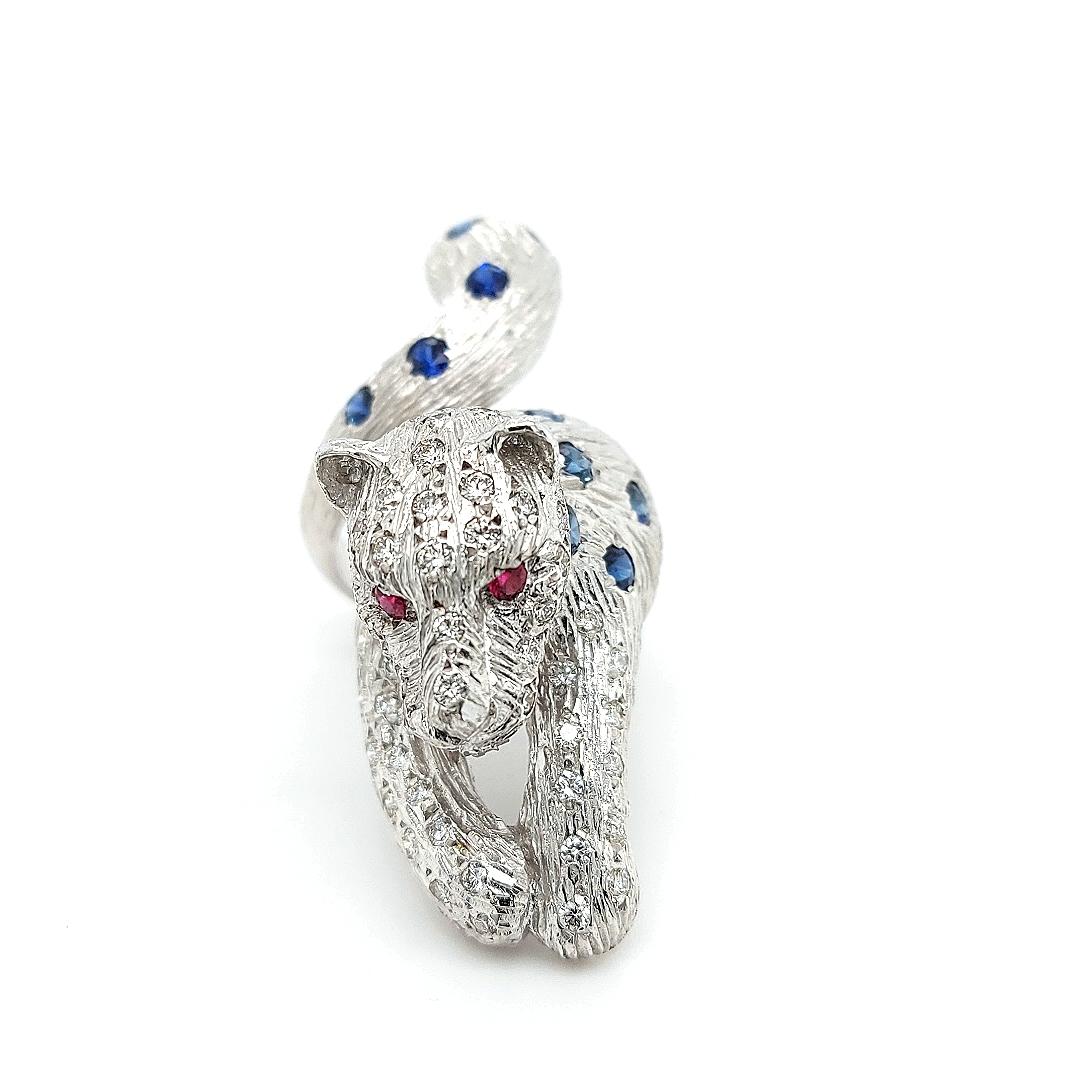 Round Cut 18kt Maramenos Pateras Panther or Tiger Ring with Diamonds and Sapphires For Sale