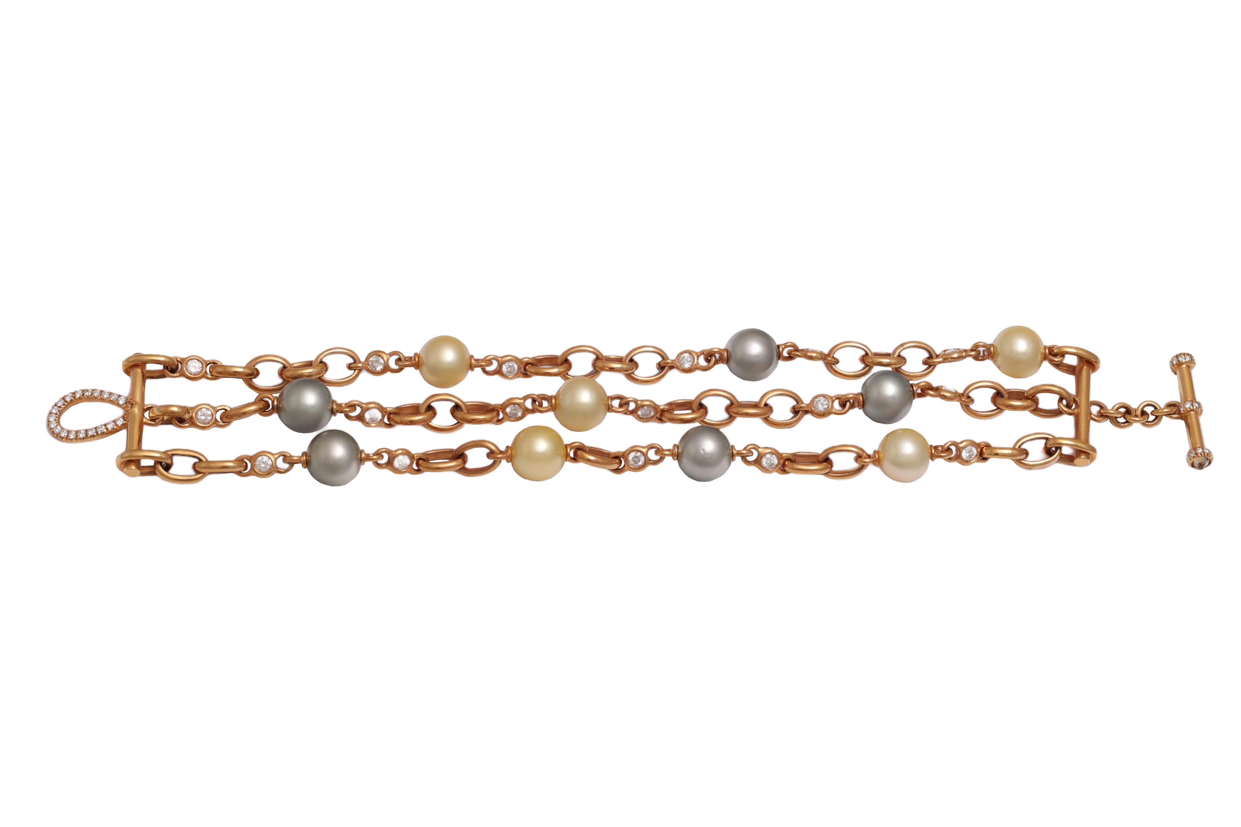 Bracciale con perle e diamanti multicolore 18 Kt

Dimensioni: si adatta a un polso di massimo 18 cm (le dimensioni possono essere adattate aggiungendo alcuni link).

Peso: 58,9 grammi 
