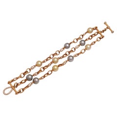 Bracciale con perle e diamanti multicolore 18 Kt