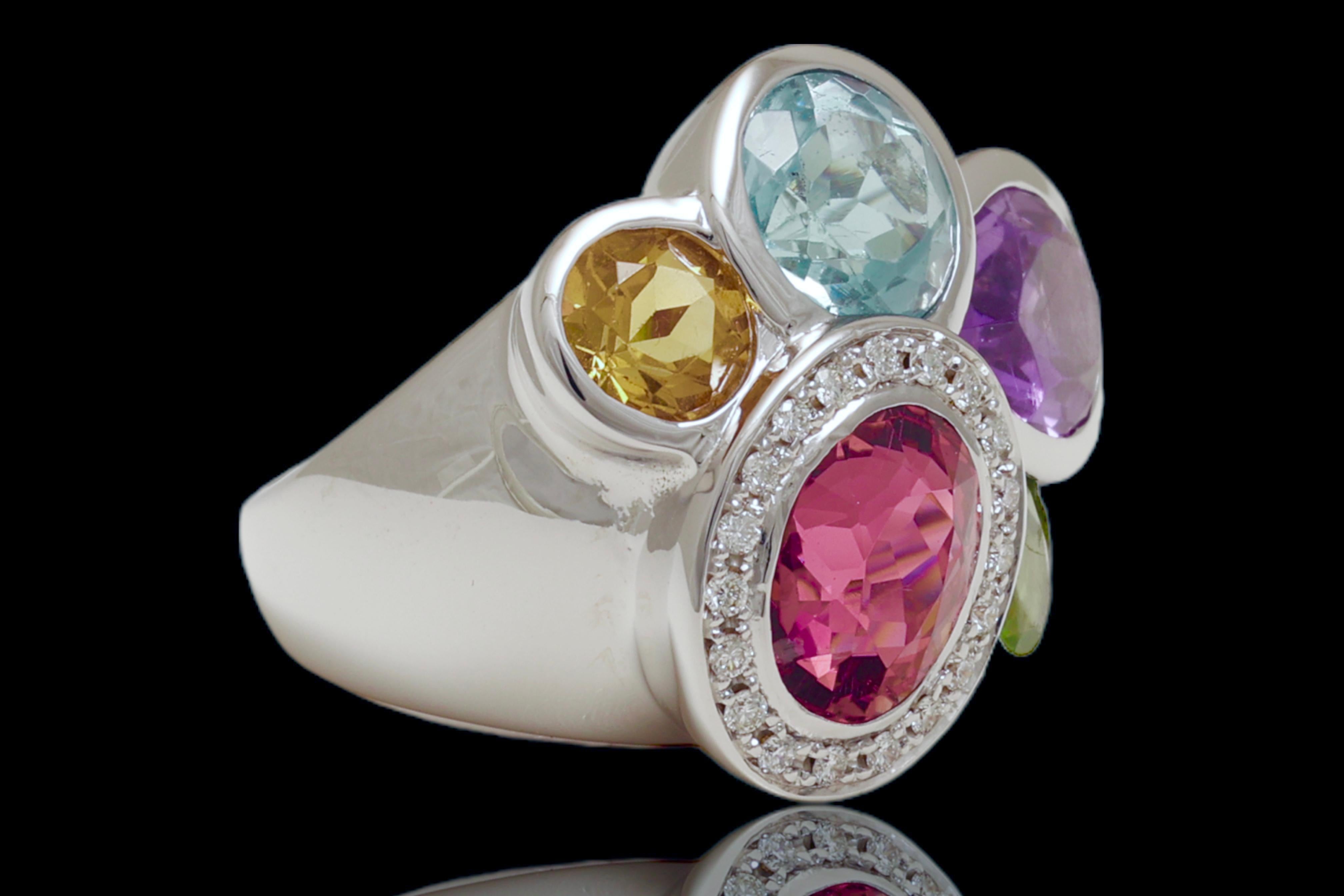 18 Kt Multi Precious Gem Stone Diamond Ring

Diamonds : Brilliant Cut Diamonds 0.34 Ct

Ring size: 55 EU / 7.25 US ( can be adjusted for free)

Total weight: 13.7 gram / 0.480 oz / 8.8dwt
