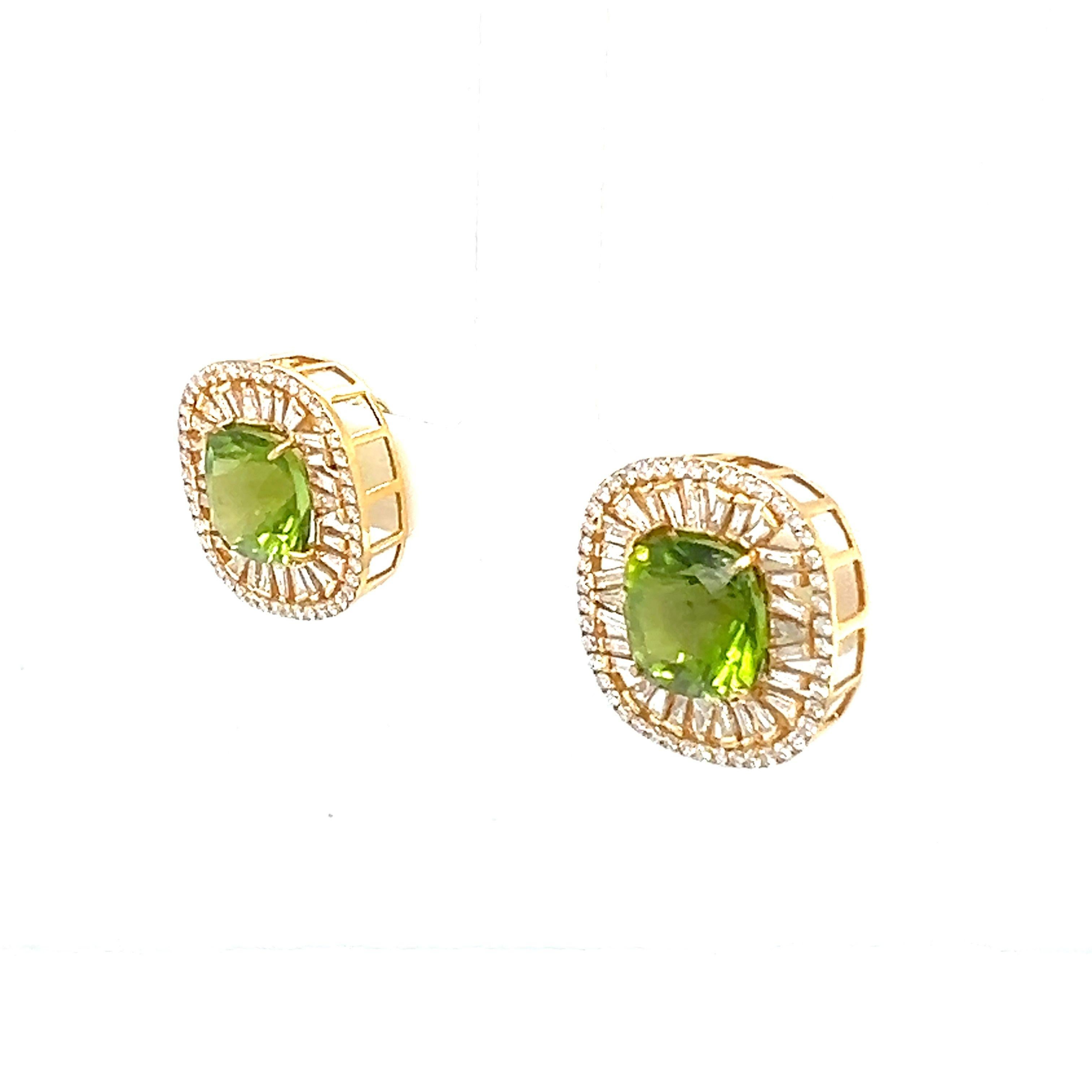 A stunning pair of 18-Kt yellow gold stud earrings are feature with natural 9.80-carat Peridot and 1.48-carat diamonds. 