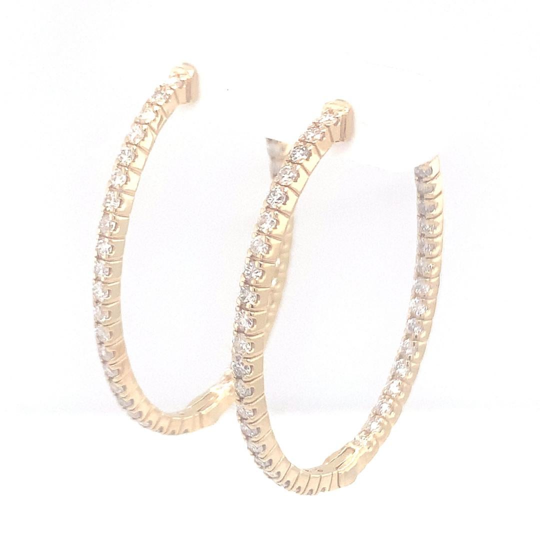 Round Cut 18-Kt Oval shaped 1.55 carat diamond hoop earrings For Sale