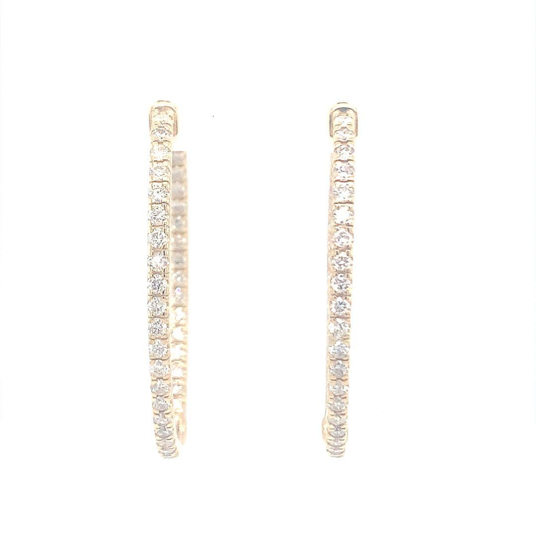 Women's 18-Kt Oval shaped 1.55 carat diamond hoop earrings For Sale