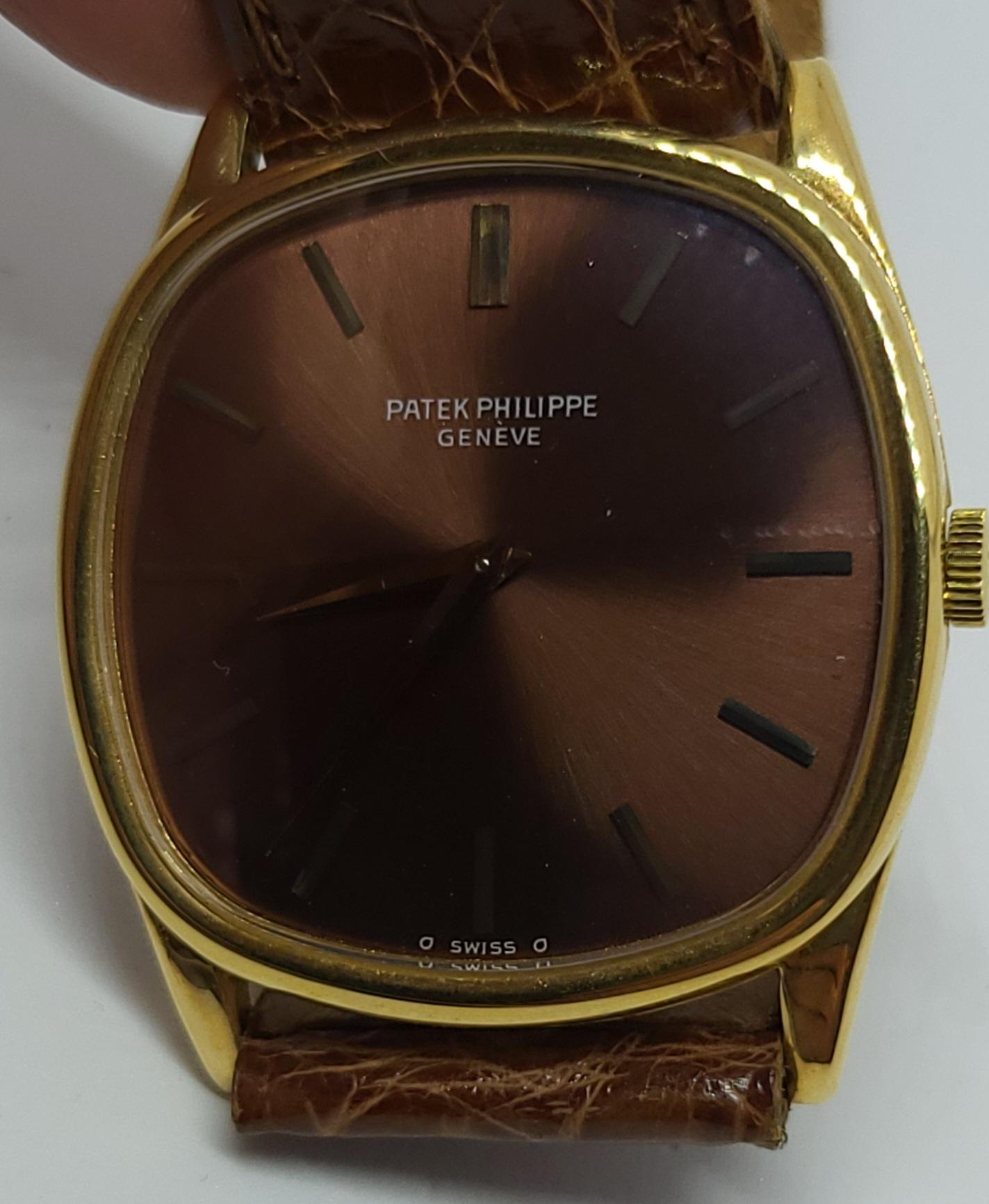 Patek Philippe TV / Ellipse 18k Gelbgold mit Vermeer / Bronze Zifferblatt Herrenuhr 3644 mit Patek Herkunftszertifikat.

Uhrwerk : Kaliber 23-300 PM , Uhrwerk mit Handaufzug. Rhodiniert, 