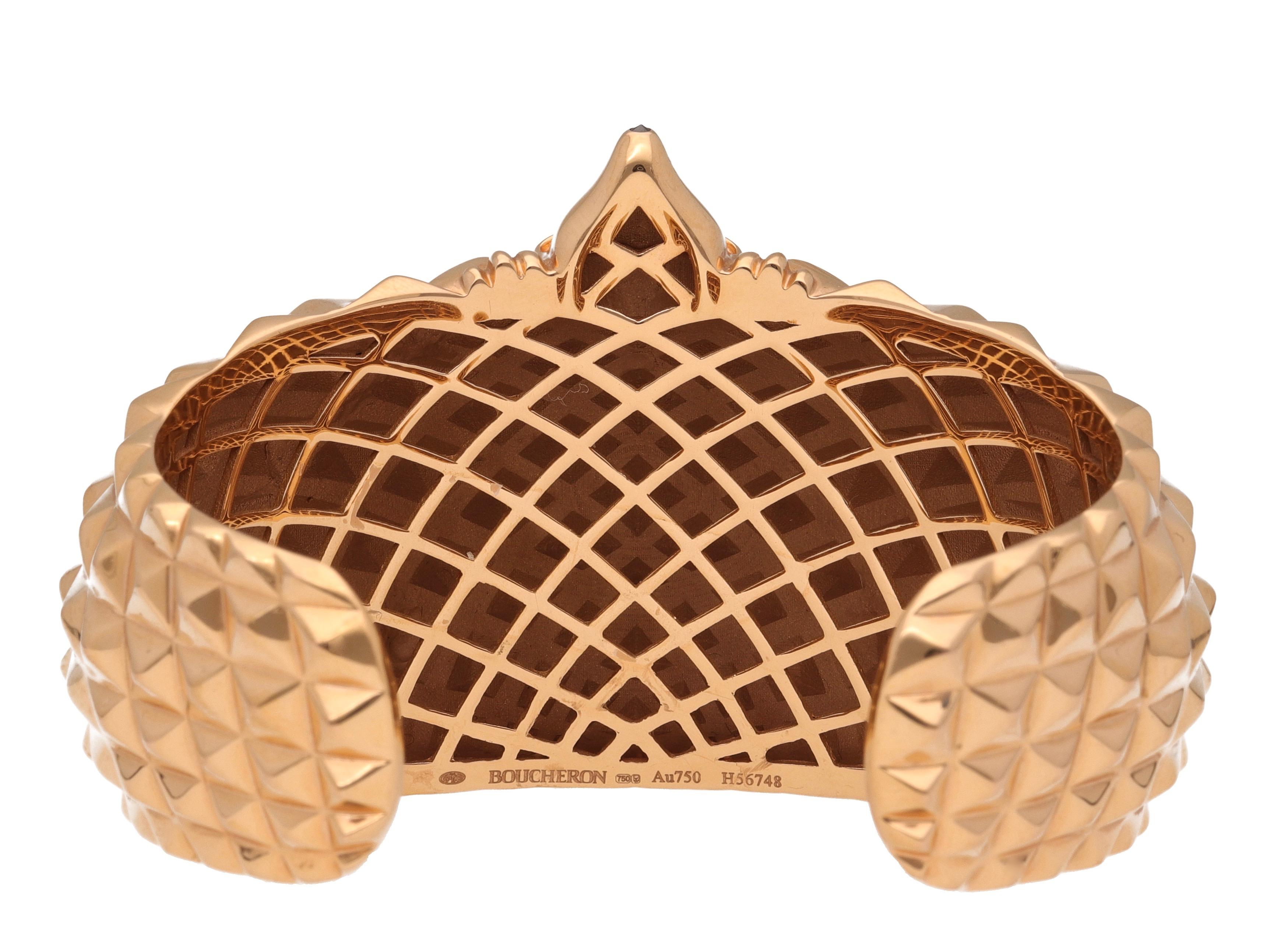 18 kt. pink gold bangle with rubies ct. 0,03 and black sapphire ct. 0,02 signed by Boucheron.
Is a perfect cocktail bangle, modern and stylish.
The precision of the pink gold crafting adds surprising reality to the animal. 
Comes with the original