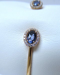 18 Karat Rose Gold 0.22 Carat White Diamonds 0.80 Carat Blue Sapphire Bangle