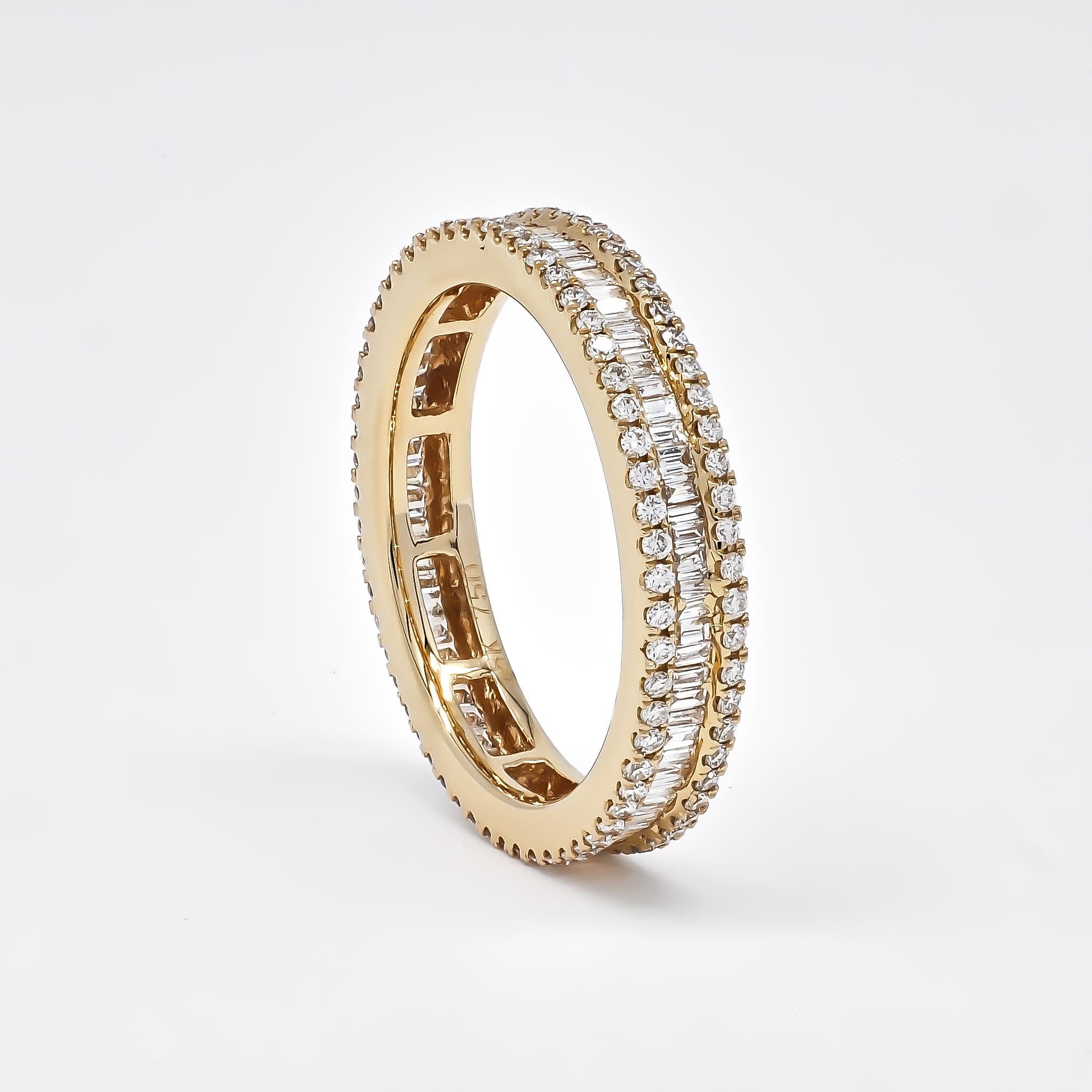 
A modern masterpiece, this striking band features brilliant baguettes bordered by stunning round-shape diamonds.

An elegant row of baguette diamonds gleams brightly amidst two rows of round-shape diamonds in this extraordinary band. When set in a