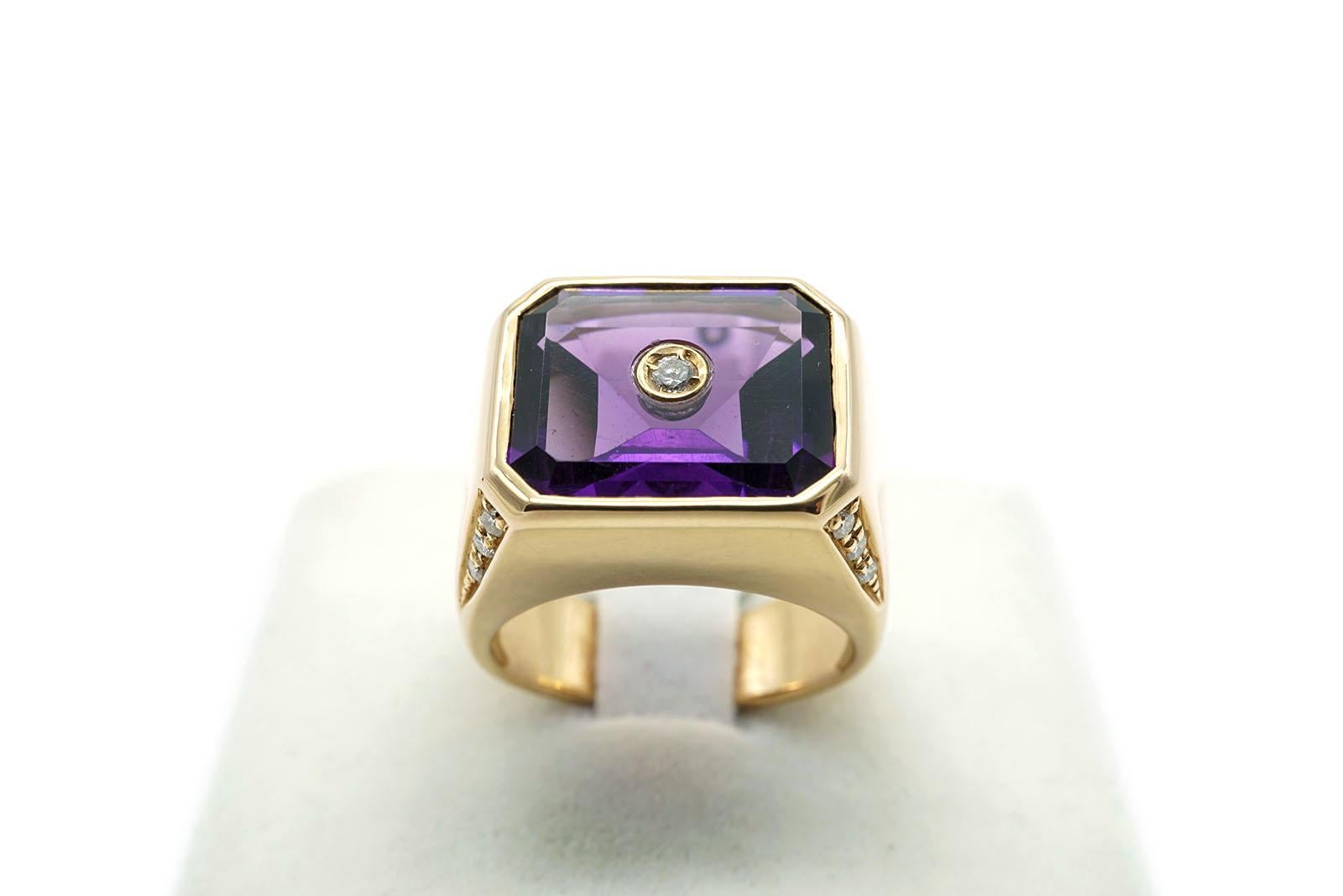 Chevalier ring in 18 Kt  pink gold. the ring weighs gr 13.70.
it has an octagonal Amethyst which size cm 1.10 x 1.30.
The ring has Diamonds in the four corners and one Diamond set in the Amethyst centre.
Diamonds weigh is ct 0.20.
The size of the