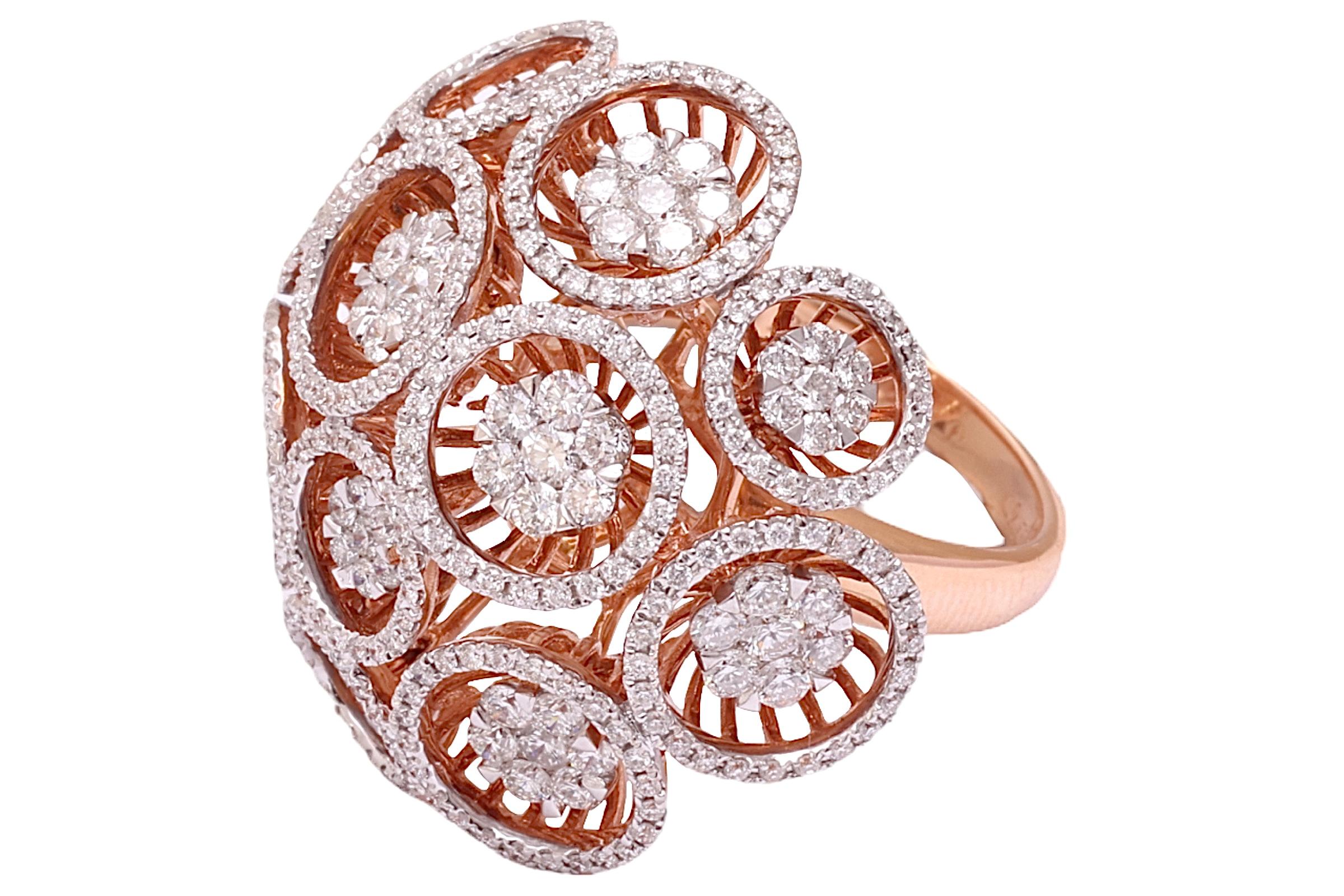 Magnificent 18 kt. Rose Gold Flower Shape  Ring With 2.6 ct. Diamonds

Diamonds: Brilliant cut diamonds together 2.6 ct.

Material: 18 kt. Rose gold

Ring size: 54.4 EU / 7 US, can be resized for free

Total weight: 15.1 gram / 0.535 oz / 9.8 dwt 