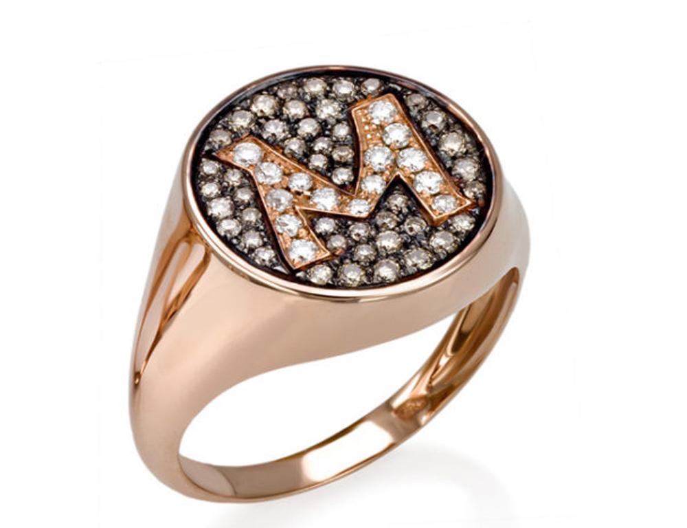 This stunning 18 kt Rose Gold initial ring is set with sparkling White and Champagne diamonds. It also looks great as a pinkie ring. 

This ring is made to order in your size. Allow 10-20 working days for delivery.