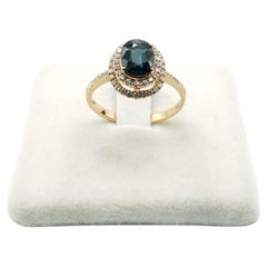 18 Kt Rose Gold Oval Cut Blu Sapphire and Diamonds Estate Ring