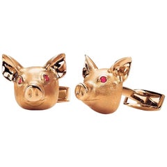 18 Karat Rose Gold Pig Head Cufflinks with Ruby Eyes