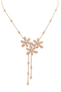 18 kt. Collier de fleurs et boucles d'oreilles pendantes en or rose avec 4,5 ct. Diamants