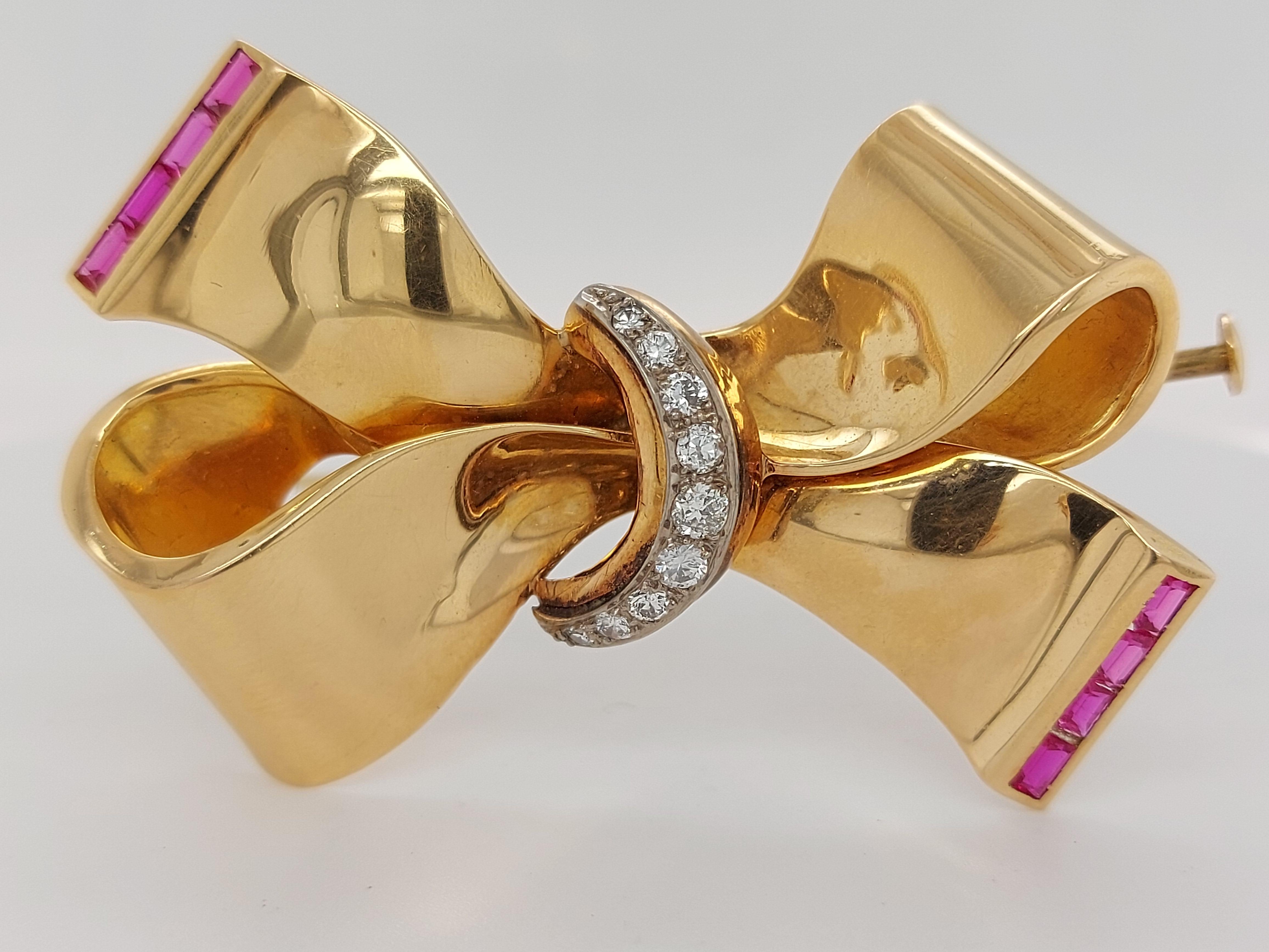 Women's 18 Karat Shiny Yellow Gold Bow / Ribbon Brooch Set with Diamonds and Rubies For Sale