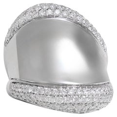 Bague en or blanc massif 18 Kt avec diamants