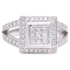 Bague en or blanc massif 18 Kt, sertie invisible de diamants de taille Princesse et Brilliante