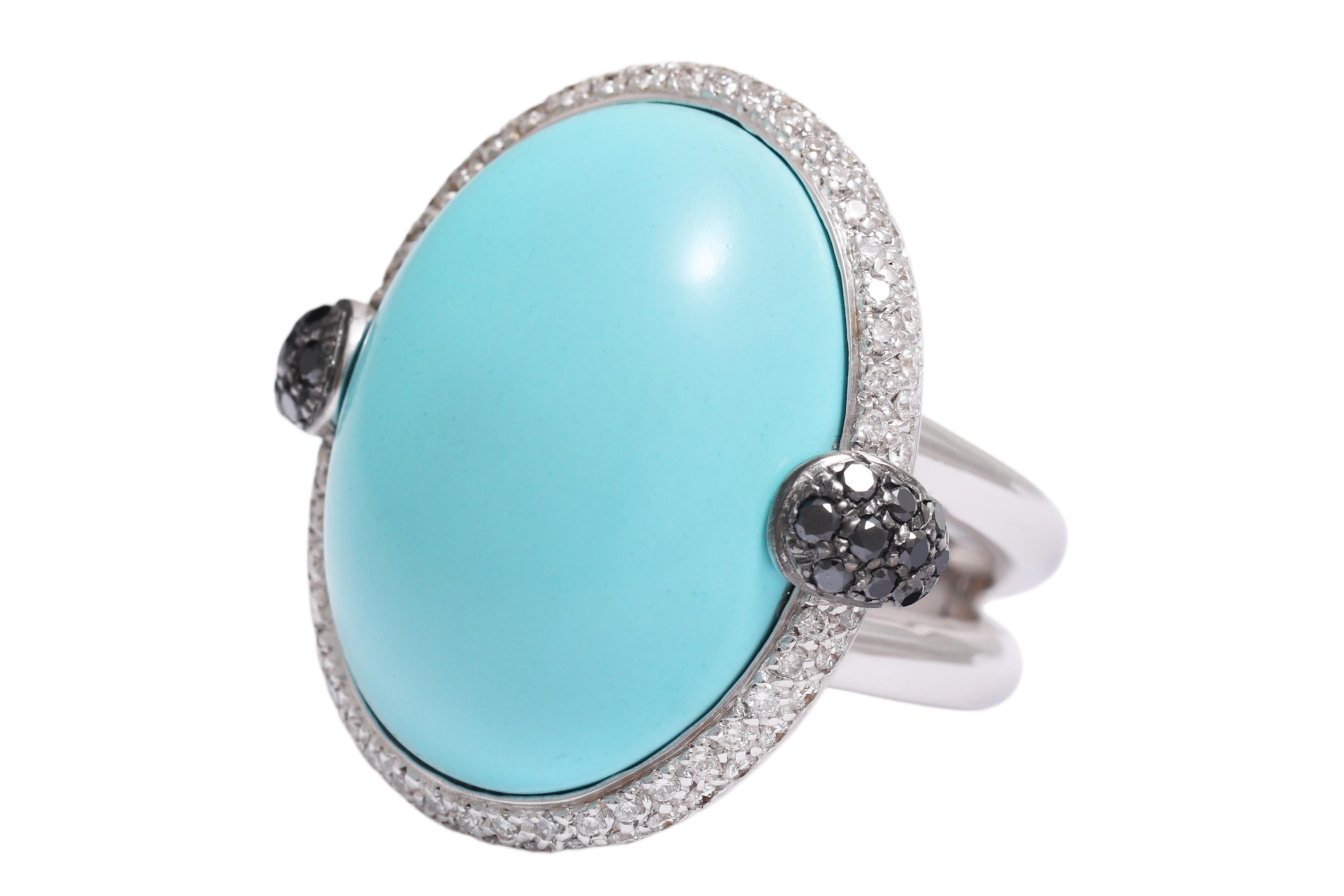 18 Kt Türkis Cabochon & Diamant Ring 

MATERIAL: 18 kt Weißgold

GEWICHT: 21,60 Gramm / 13,90 dwt / 0,760 Unzen

GRÖSSE: 55 (die Größe kann kostenlos geändert werden)

DIAMANTEN: weiße Diamanten im Brillantschliff (zusammen ca. 0,72 ct), schwarze