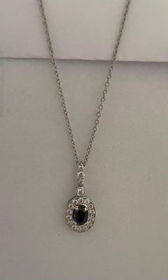 18 kt WG pendant with chain , Diamods and sapphire 