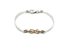 Bracelet manchette en or blanc et rose 18 carats avec aigue-marine et nœuds Savoy
