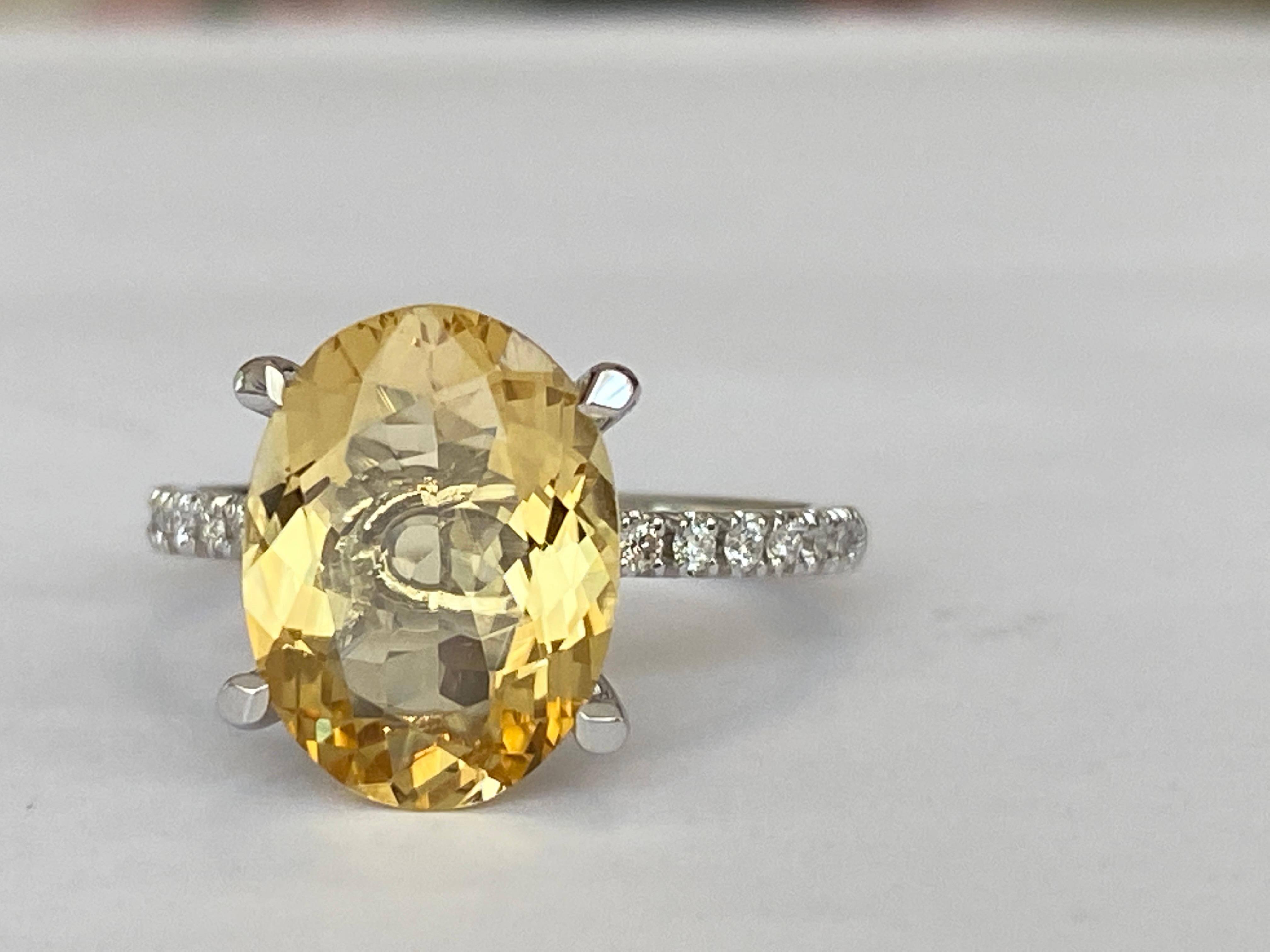 Offered beautiful ring in white gold, with a beautiful oval cut yellow beryl 3.53 ct. The ring is decorated with 16 pieces of brilliant cut diamonds, 0.20 ct in total, of quality G/VS/SI.
Gold content: 18 KT (hallmarked)
Natural yellow beryl: 3.53