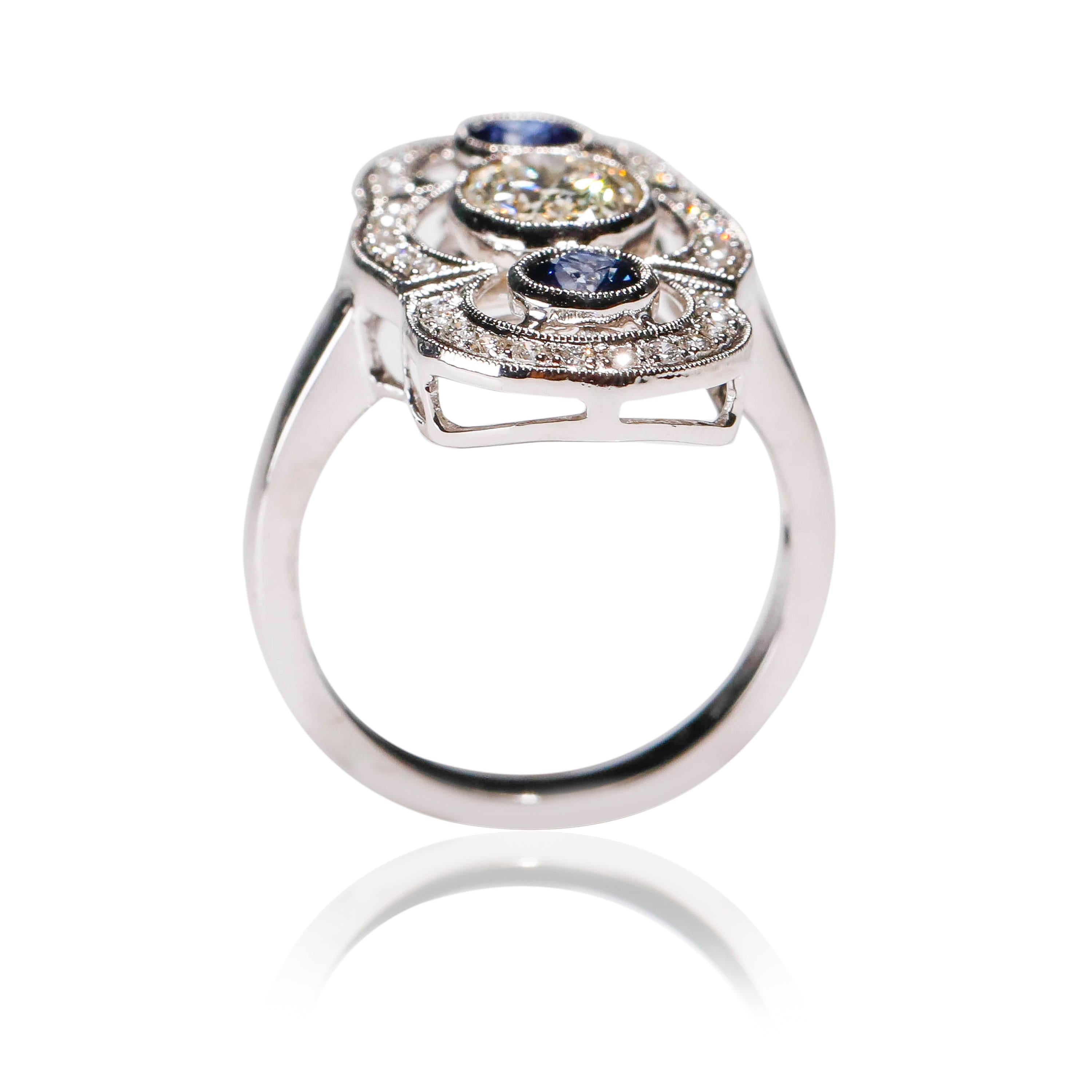 18 kt White Gold 0.52 Ct Blue Sapphire 1.30 Ct Oval White Diamond Long Ring In New Condition For Sale In New York, NY