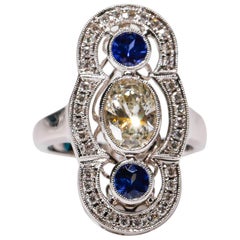 18 kt White Gold 0.52 Ct Blue Sapphire 1.30 Ct Oval White Diamond Long Ring