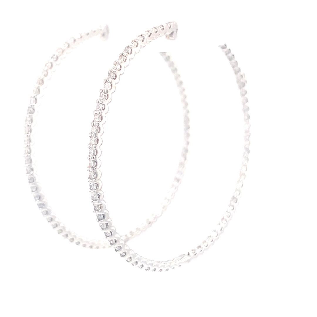 Round Cut 18-Kt white gold 1.20 carat diamond hoop earrings For Sale