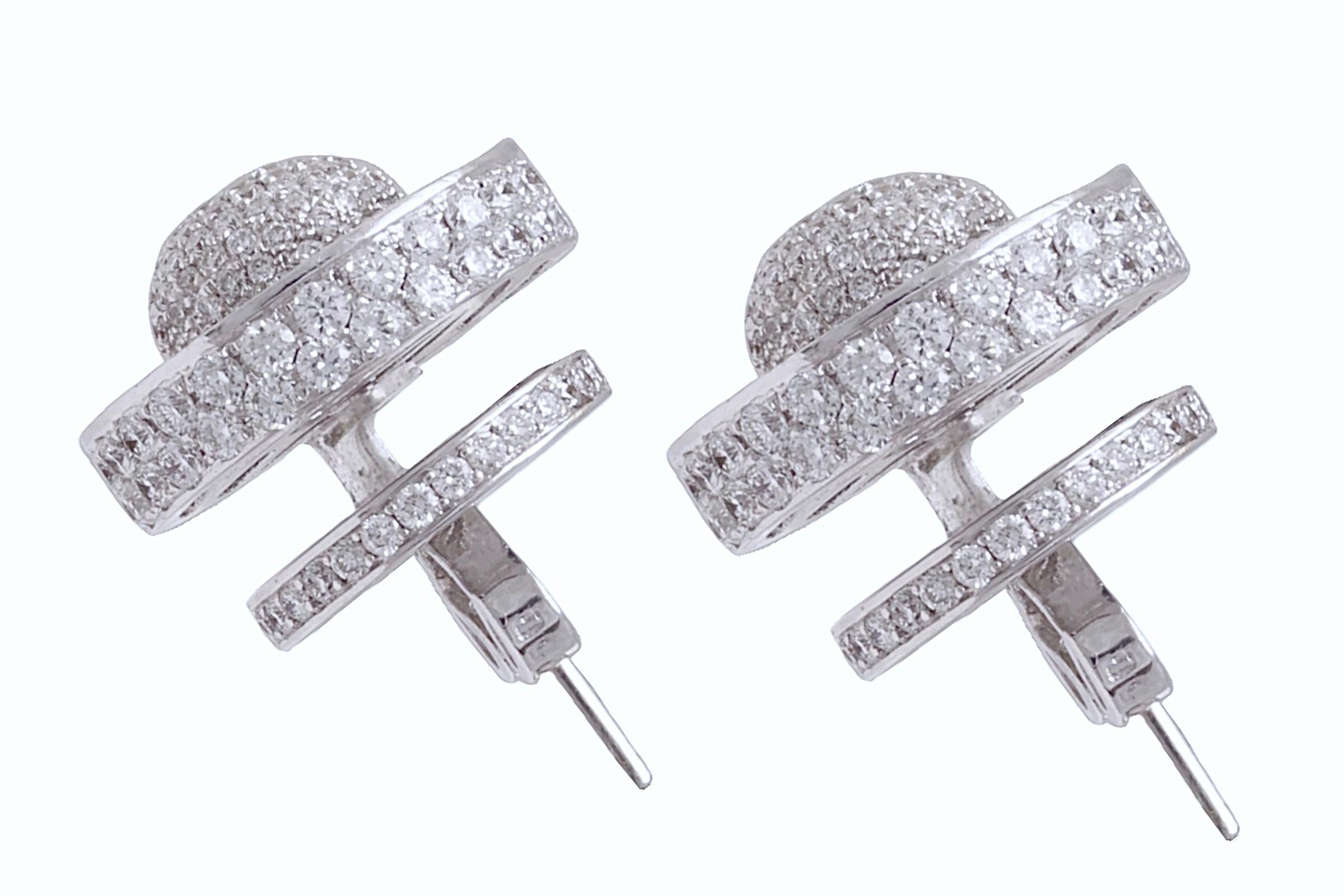 18 kt. White Gold 2 in 1 Stud Earrings With 4.08 ct. Diamonds, Amazing Piece! 

There are few diamond earrings, that offer a two in one function. With this particular design you can turn your favourite round brilliant stud earrings, into a